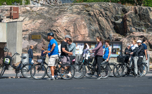 Group of walkers gathered at a park entrance in Skien